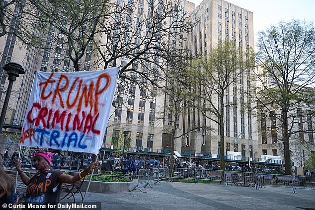 Outside the court, a maze of barricades kept protesters away from Trump's criminal trial