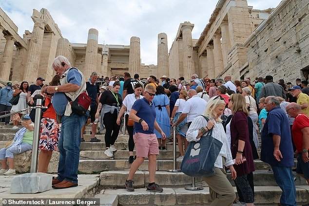 Located in Athens, the historic site typically welcomes around 22,000 visitors per day during the high summer season - which inevitably leads to overcrowding (stock image)