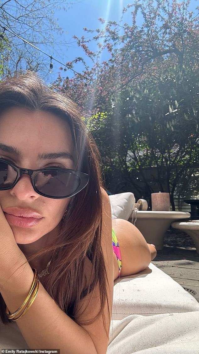 Emily later posted a photo of herself on Monday lying on a lounge chair while wearing a bikini to take advantage of New York's unseasonably warm 80 degree Celsius spring weather