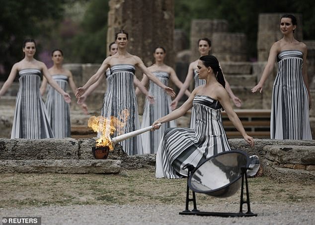 1713260807 407 Olympic torch is lit in spectacular ceremony in ancient Olympia