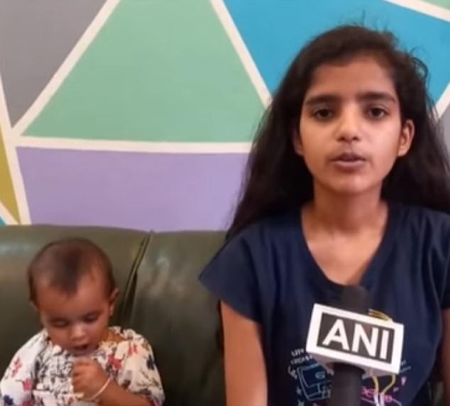 Nikita (right) said she was with her 15-month-old niece (left) at the time, who the teen said was scared, so she showed some quick thinking as she tried to get the marauding monkeys out of the house