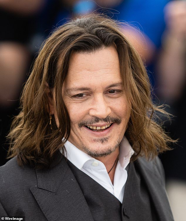 Fans said he looked like Captain Jack Sparrow as he showed off his 'rotten' teeth during his Hollywood comeback at the Cannes Film Festival on Tuesday