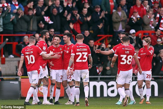 Wrexham secured promotion to League One after a resounding 6-0 win over Forest Green