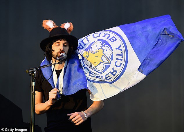 Pizzorno wears a Leicester flag around his shoulders during an appearance at the club's 2016 Premier League title parade