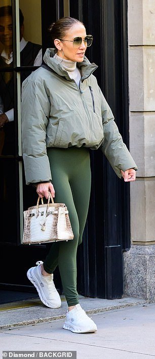 The fashion-forward Hollywood star created a monochrome look by adding a cropped, light green puffer jacket