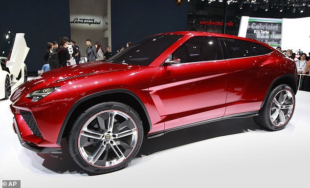 He had used the boat ramp to access the beach, where he drove back and forth for a few minutes before trying to maneuver his £200,000 Lamborghini Urus back up the ramp after noticing the panicked beachgoers, a witness told the local media (file image of a Lamborghini Urus)