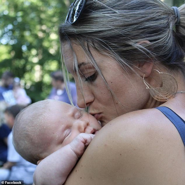 Postpartum psychosis is defined by the National Institutes of Health as a serious form of mental illness.  (Photo: Lindsay Clancy with her child)