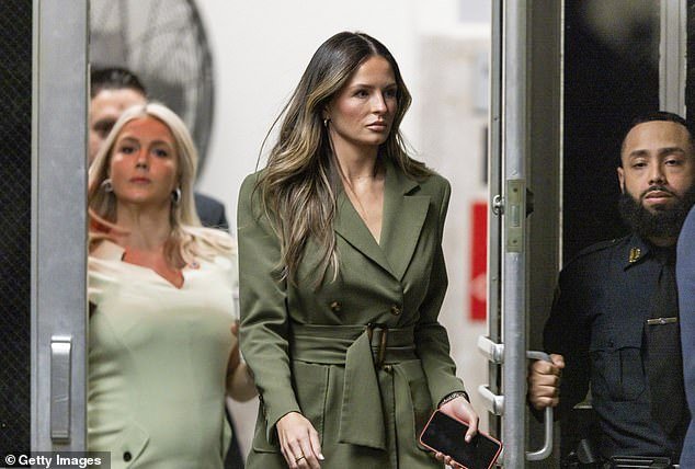 Margo Martin (C), deputy communications chief for former US President Donald Trump, walks into the courtroom during the second day of his criminal trial at Manhattan Criminal Court on April 16, 2024 in New York City