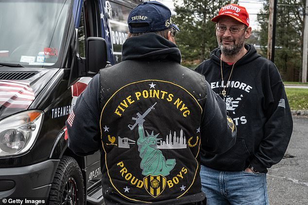 Members of the Proud Boys gathered earlier this month to show their support for Trump ahead of his first criminal trial, the Stormy Daniels hush-money case