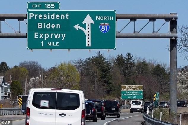 President Joe Biden's motorcade passes under a sign for the President Biden Freeway in Scranton, Pennsylvania, on Tuesday