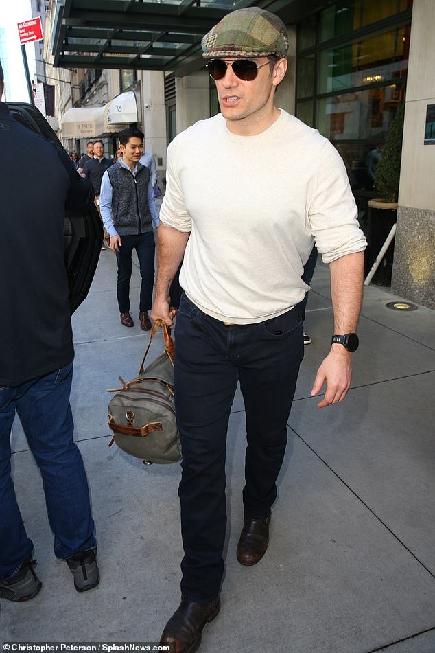 Cavill was spotted leaving the luxury hotel on 56th in Midtown Manhattan on Tuesday wearing a white sweatshirt with the sleeves rolled up.