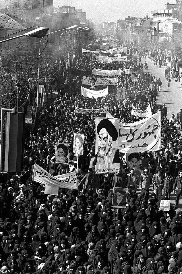 Khomeini's supporters march in Tehran in 1979, after the mullahs had seized power