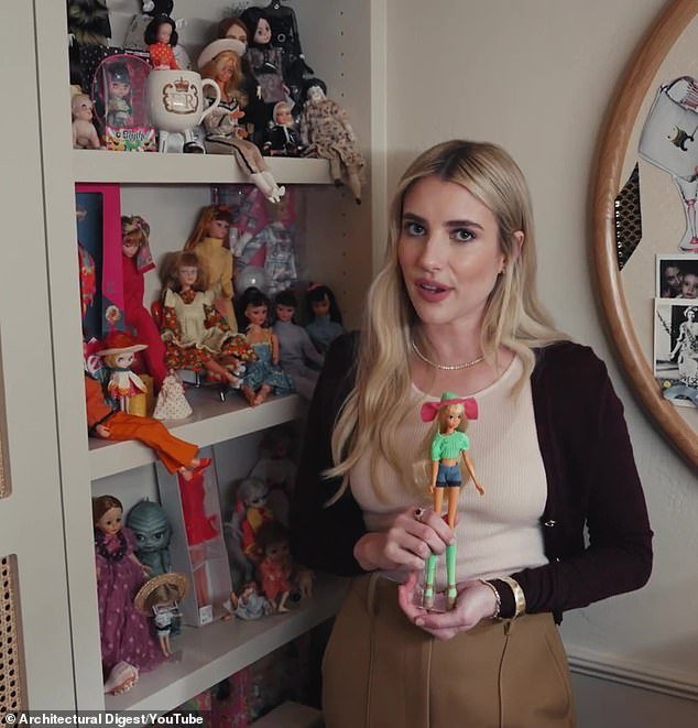 Norwood was far from the only collectible the New York native showed off, with her whimsical dream home completed with an entire 'doll wall' (pictured)