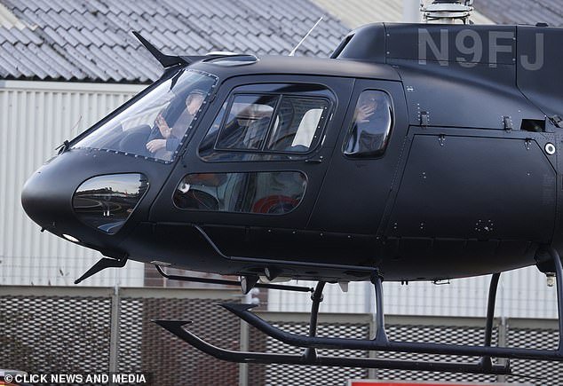 The movie star flashed a big smile as he piloted a helicopter - one of his favorite modes of transport - to fly between the British countryside and London for filming for Mission Impossible 8.