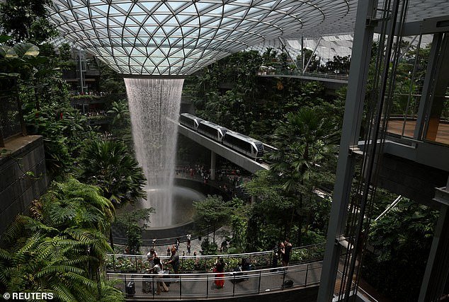 Jewel Changi Airport features incredible architecture, including the tallest and largest indoor waterfall in the world: the HSBC Rain Vortex, which stands at 40 meters high