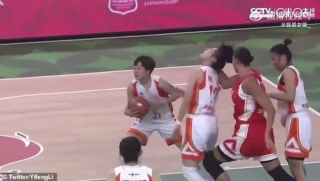 Cambage (second from right) is seen on video punching an opponent in the face from behind during a match in China