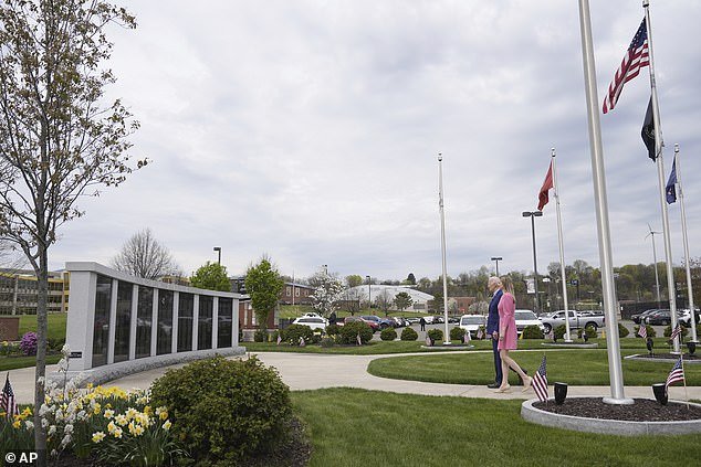 President Joe Biden visits the war memorial in Scranton, Pennsylvania, with Scranton Mayor Paige Cognetti, right, Wednesday, April 17, 2024