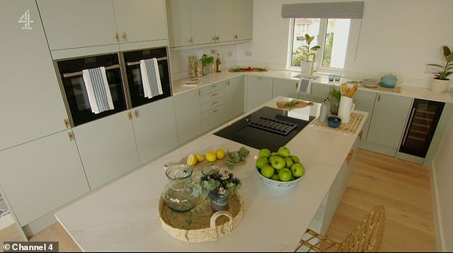 Thanks to Stacey's help, the couple installed the kitchen and laid the wooden floors themselves