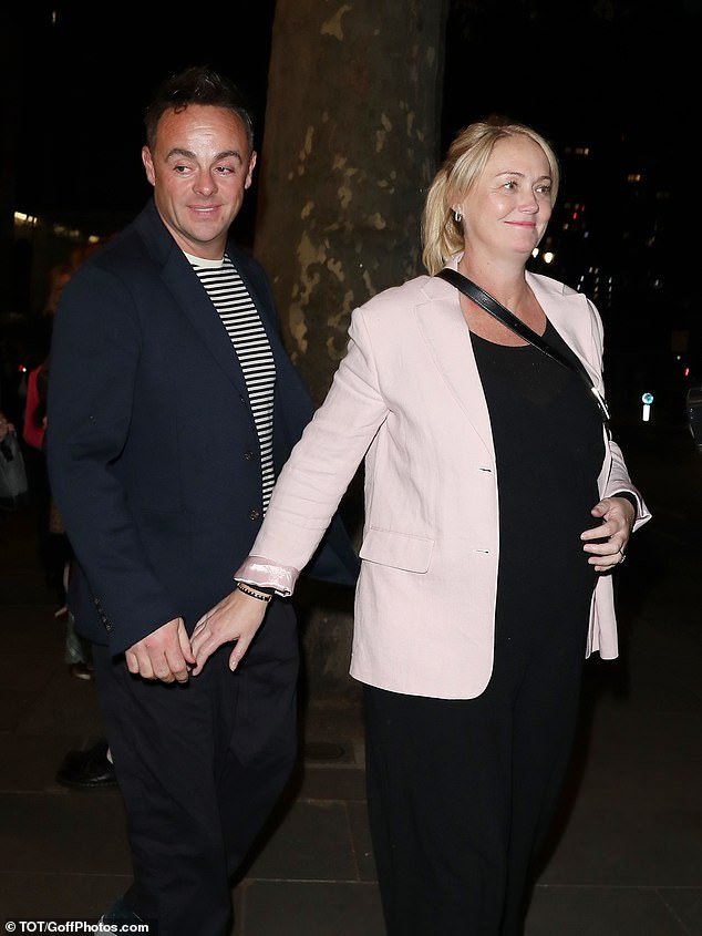 Ant, who was dressed in a navy blue jacket and striped top, sweetly held his wife's hand as they headed to their car