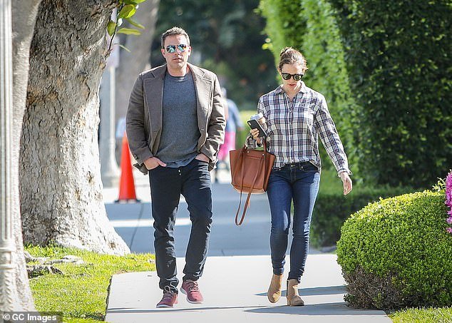 Ben Affleck with his ex-wife Jennifer Garner.  The couple has three children together: Violet, Fin and Samuel