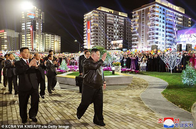 The dictator waved to the adoring crowd as he arrived at the event in Pyongyang marking the completion of the second phase of a 10,000-home housing project.