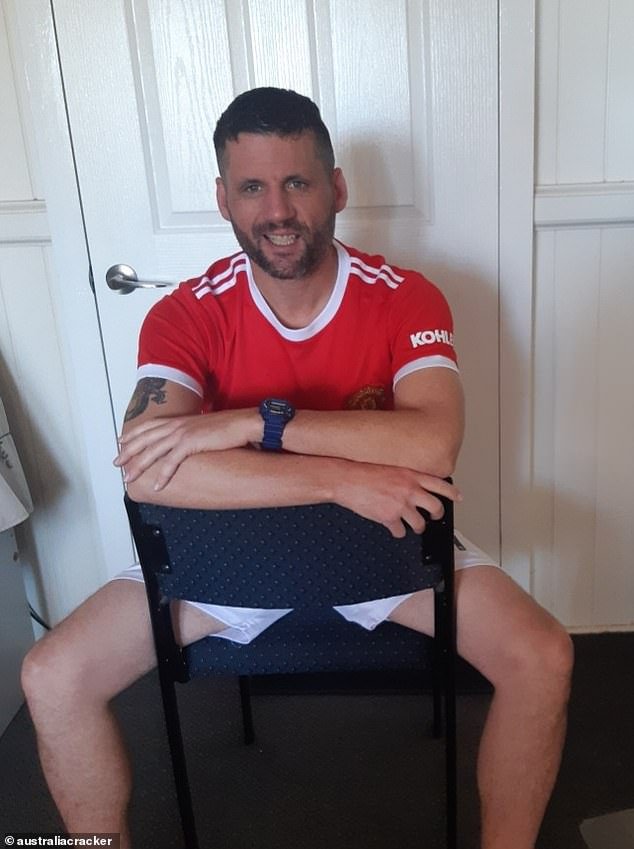 He sent a photo of himself wearing a tight-fitting Manchester United football club shirt as he sat astride a chair with his arms crossed and said he would be 'open to both men and women'.