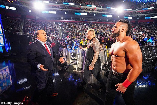He could play a role in The Bloodline storyline after Solo Sikoa (center) turned on Jimmy Uso