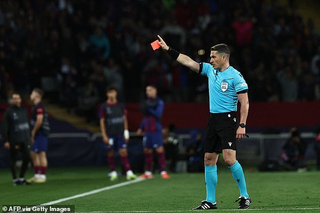 Xavi was shown a red card late in the match for dissent from referee Istvan Kovacs
