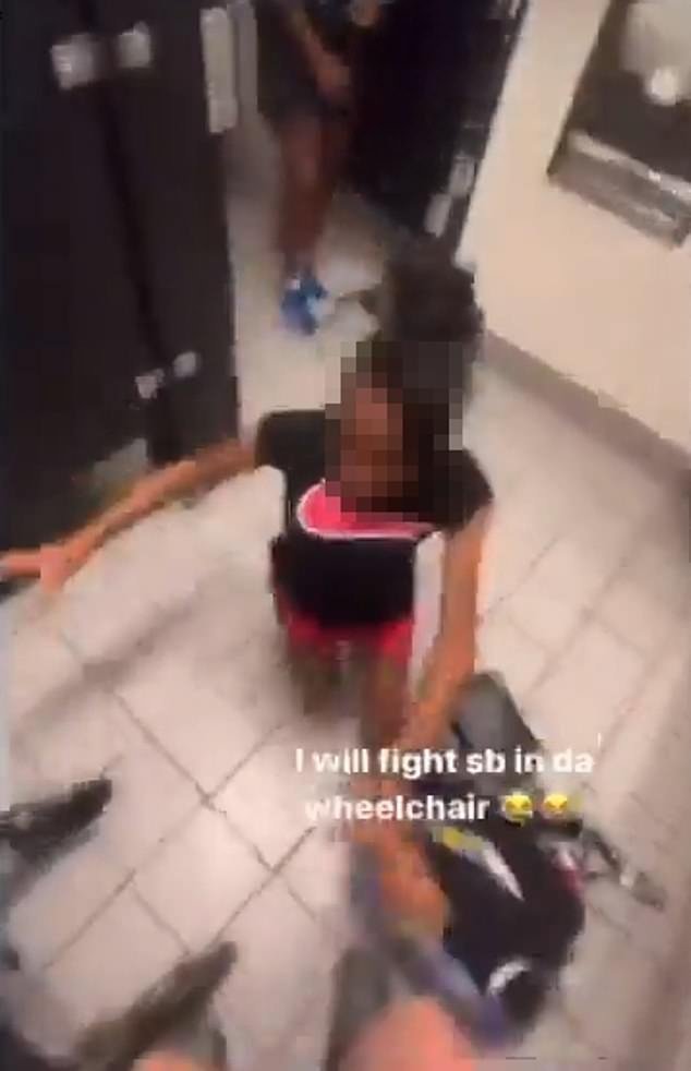 The girl is thrown across the room in a full circle after the larger student grabs her arm
