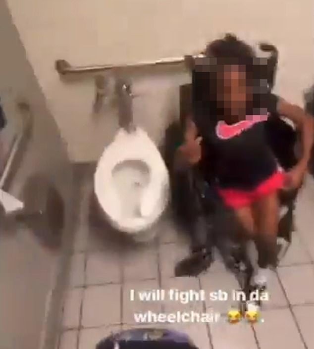 The girl may eventually stumble back into her wheelchair.  The girl who posted the images added the caption: 'I will fight SB in the wheelchair'