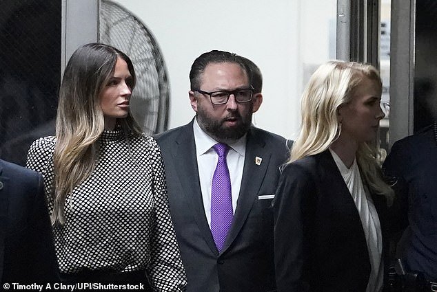 More prominent aides, including Margo Martin (left), Jason Miller (center) and Natalie Harp (right), were seen returning from a lunch break in Manhattan on Thursday