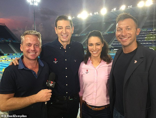 Nathan Templeton (left) during his swim report with Australian swimming legend Ian Thorpe (far right)