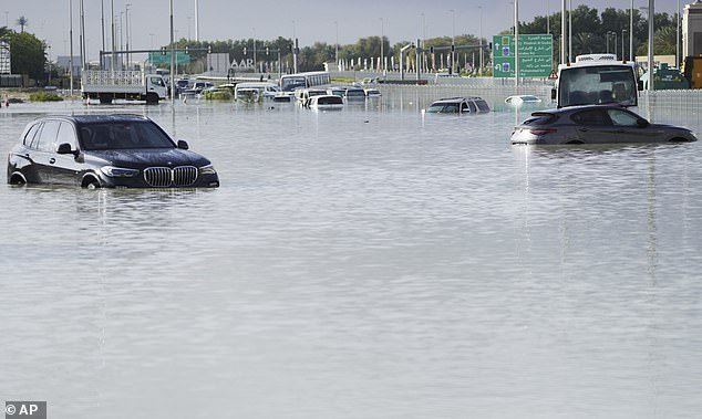 The UAE, which has just experienced devastating floods (pictured), has been using cloud seeding to increase rainfall since the 1990s.  Officials deny this caused this week's flooding