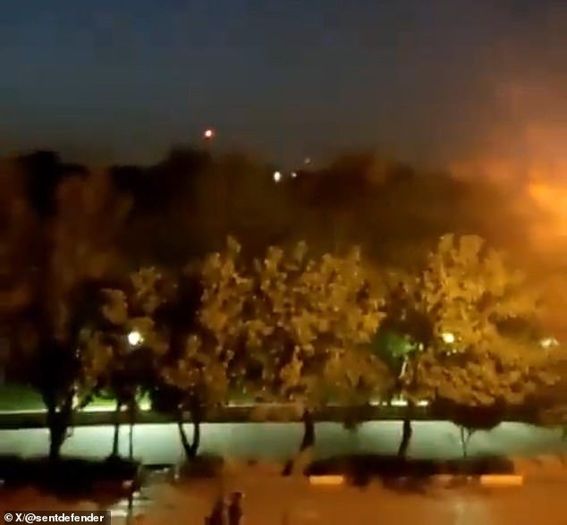 Unconfirmed images shared on social media appeared to show anti-aircraft fire over the city of Isfahan in central Iran, home to one of the country's nuclear facilities.