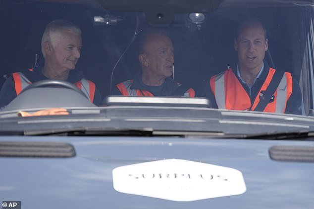 William sits in a van today during a visit to Surplus to Supper in Sunbury-on-Thames