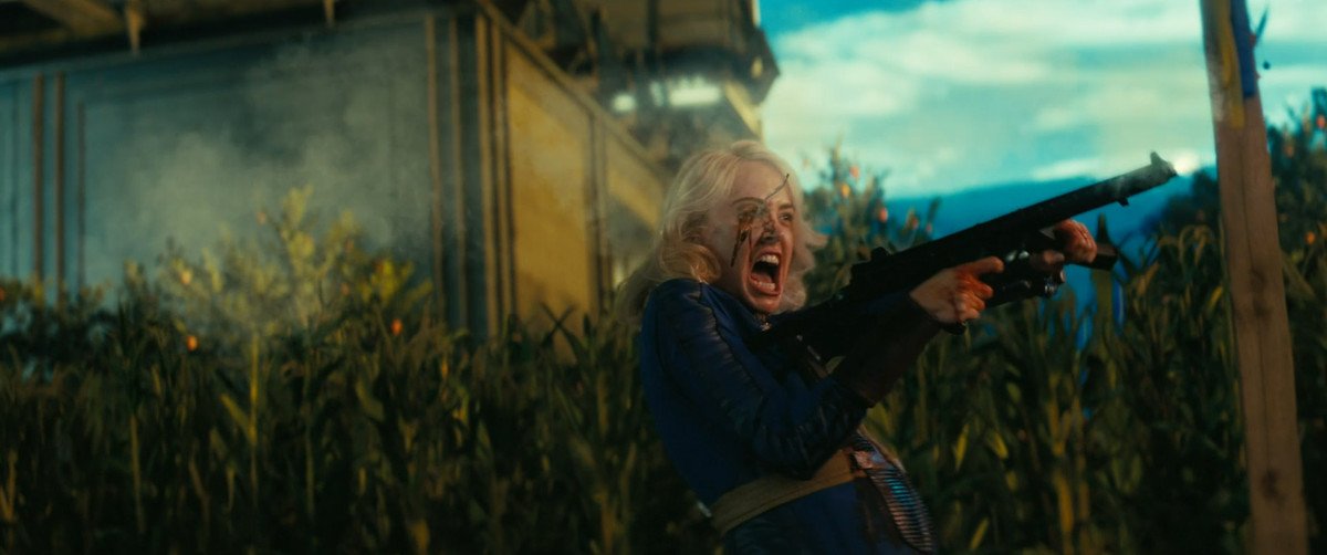A young blonde woman screams while firing a gun with a fork in her eye in Fallout