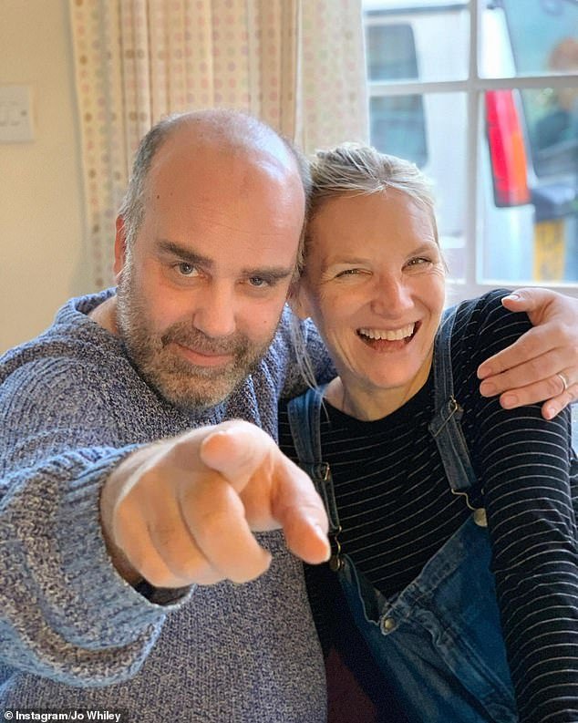 Jo said she decided to 'rethink her lifestyle' after losing more friends to COVID, epilepsy and stomach cancer, and after Radio 1 producer Simon died from a brain tumor in 2021 (pictured together)