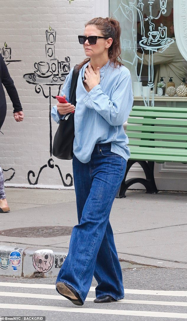 The 45-year-old actress wore a loose striped blue shirt, tucked into her oversized jeans