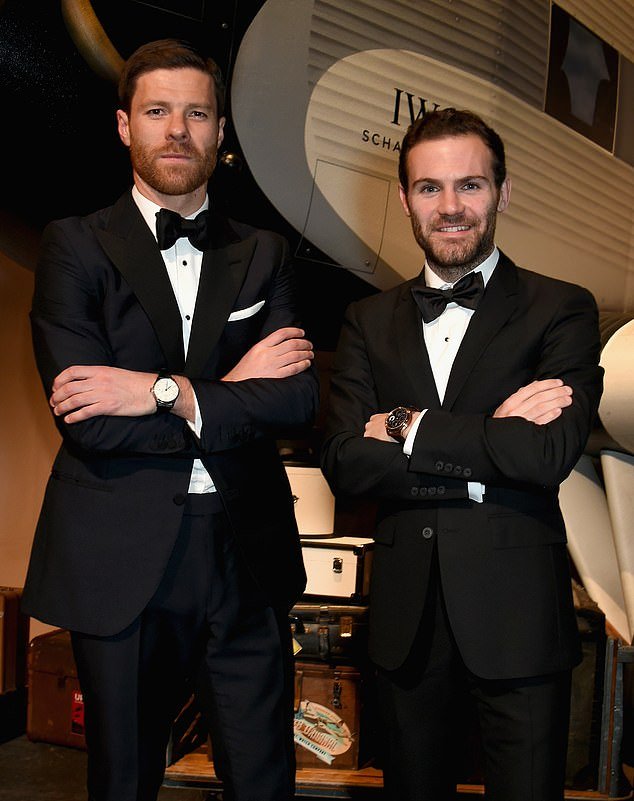 Alonso pictured with Juan Mata at the launch of an IWC Schaffhausen watch in Geneva in 2016