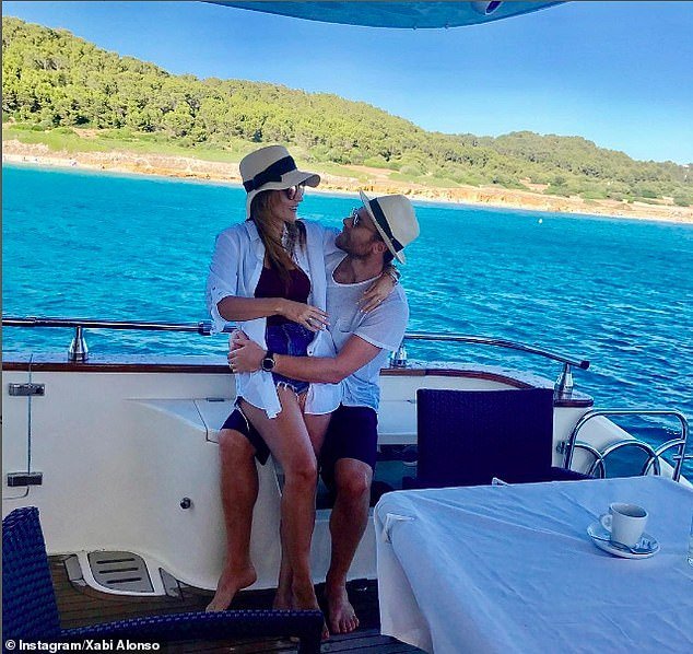 Xabi and his wife on board a boat during one of their non-football vacations
