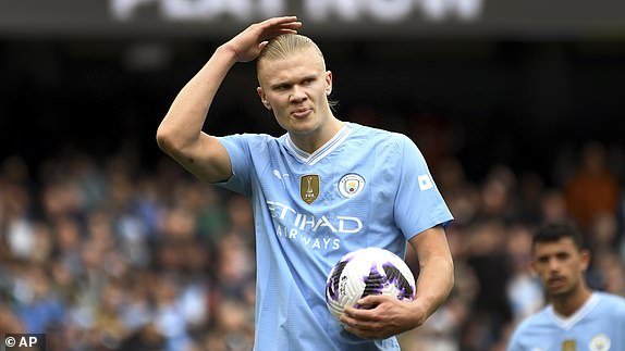 Erling Haaland of Manchester City during the English Premier League football match between Manchester City and Luton Town at the Etihad Stadium in Manchester, England, Saturday, April 13, 2024. (AP Photo/Rui Vieira)