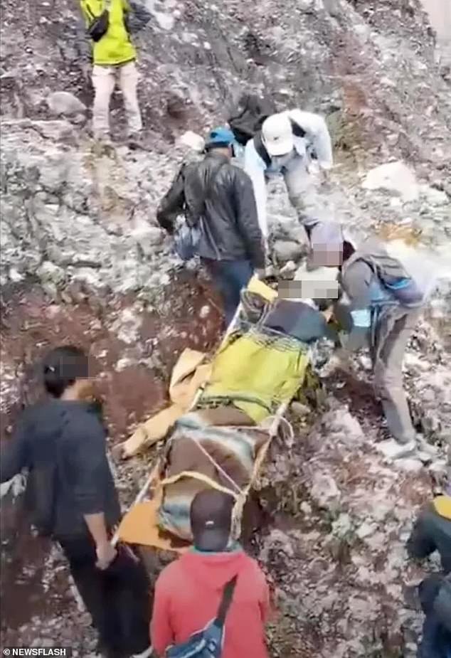 Local media said she fell 70 meters into the volcano's mouth and it took rescuers more than two hours to retrieve her body.