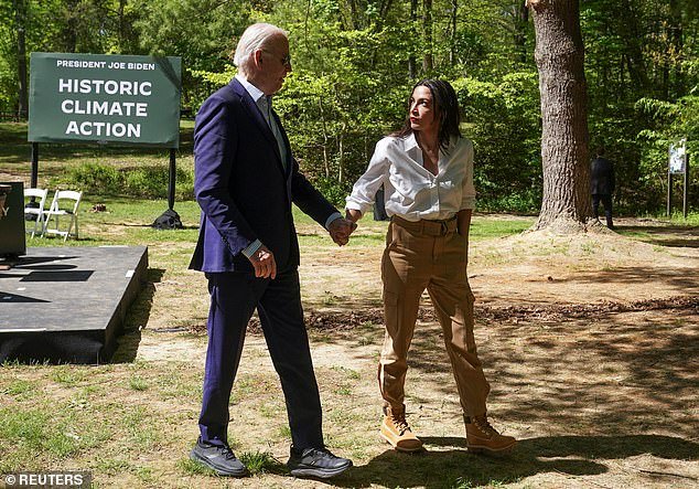 “You know, I learned a long time ago: Listen to that lady, listen to that lady,” President Joe Biden (left) told the Earth Day crowd about AOC (right).  He also said: 'We're going to talk more about another part of the world too soon' – hinting that they might talk about the Middle East