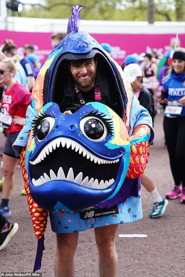 Comedian Joel Dommett walked in the Piranha costume first worn by this year's winner of The Masked Singer