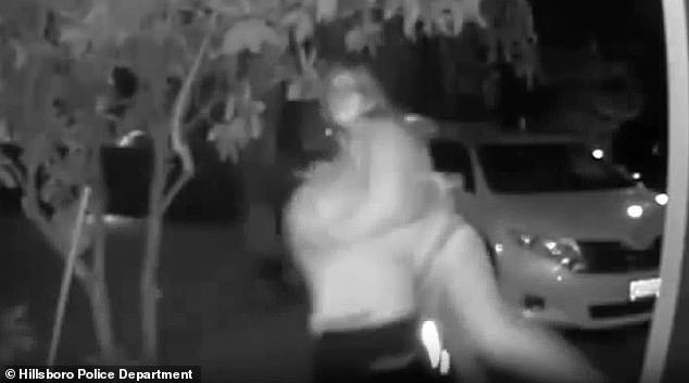 A man attacks her from behind and grabs her as she screams 'Please help me'