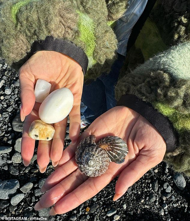 Rita showed the spoils of her journey: two handfuls of beautiful shells and beautiful smooth stones