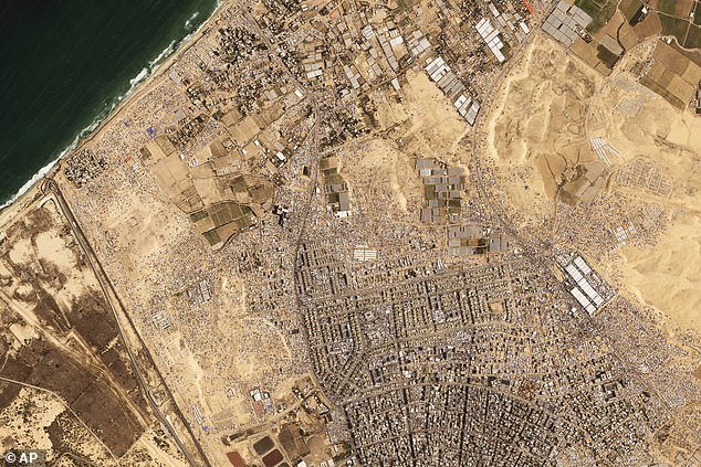 This satellite image from Planet Labs PBC shows tents and other makeshift housing built around the area of ​​the Tel al-Sultan refugee camp on Saturday, April 20, 2024