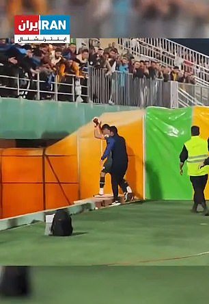 Esteghlal's captain was escorted from the field