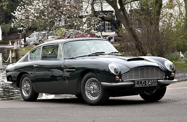 Paul's second ever car was a 1964 Aston Martin DB5, bought for £4,000 and then sold in 2017 for £1.3 million.  Two years later he also bought the next model, the DB6 (photo)