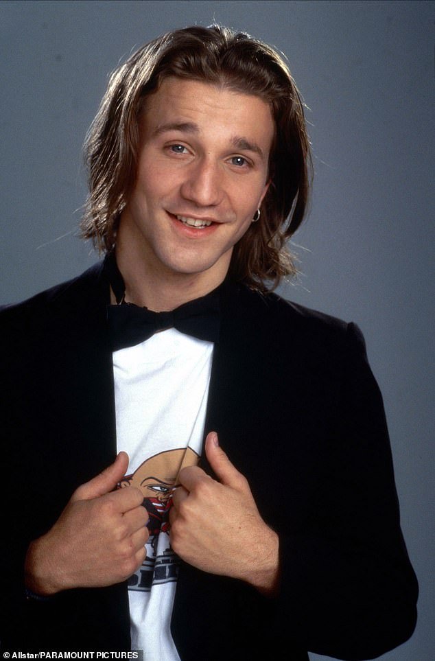 He played her love interest Travis Birkenstock in Clueless;  seen in a 1995 promo photo for the film